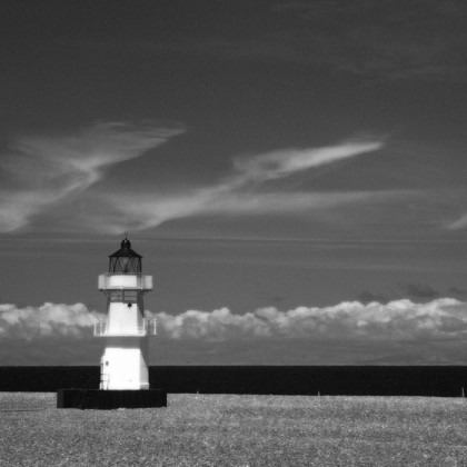 Lighthouse on shingle beach